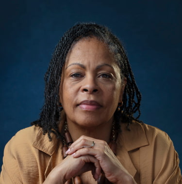Headshot depicting a woman living with Alzheimer's disease Headshot depicting a woman living with Alzheimer's disease